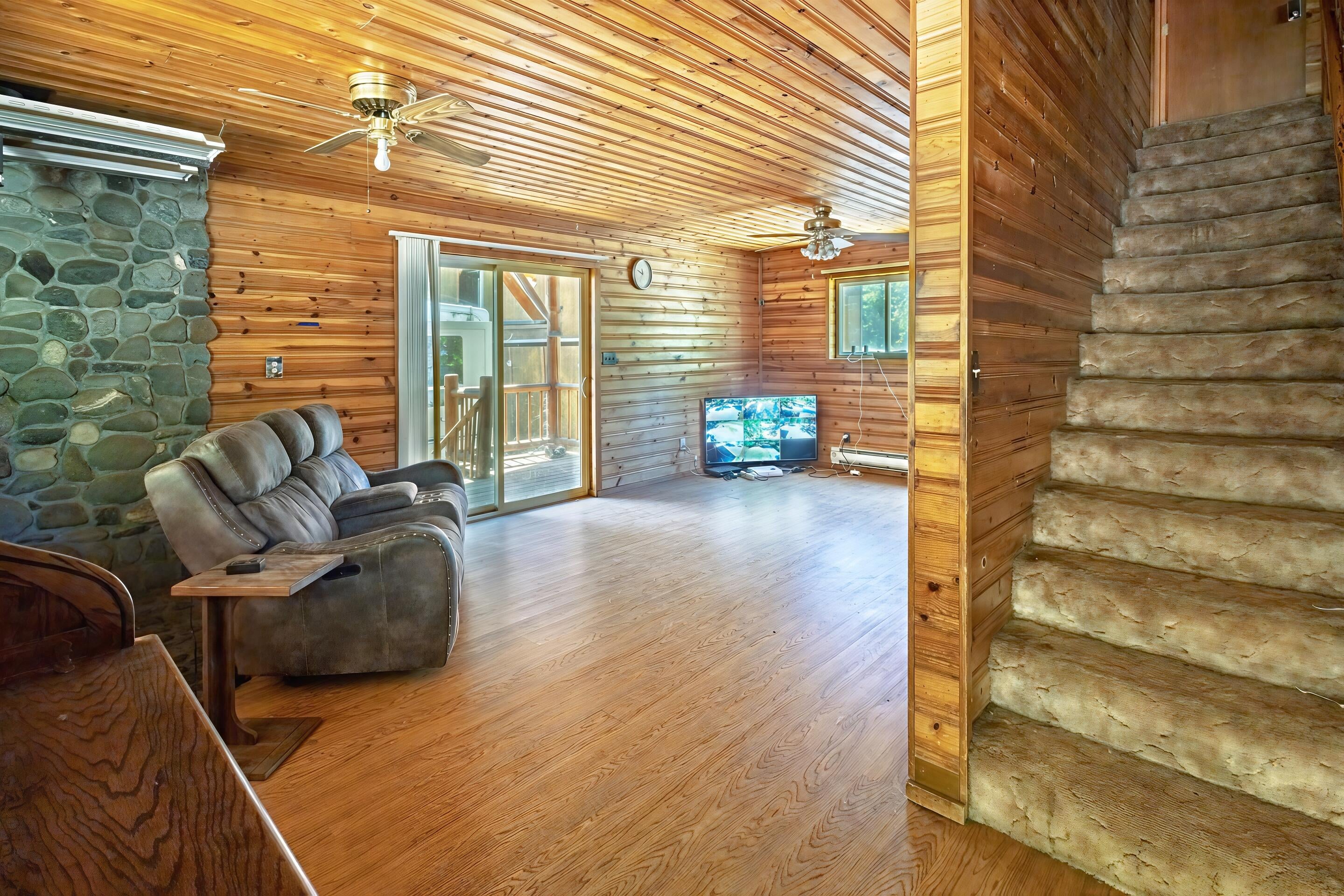 7354 Takilma Road Cave Junction, OR 97523 - Photo 5 of 30 living room and stairs
