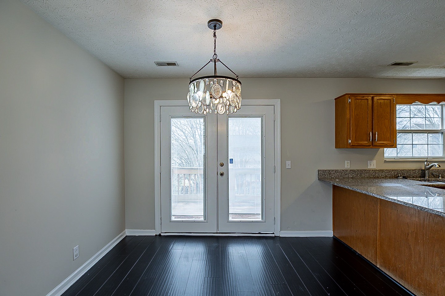 1008 Ridge Trail Goodlettsville, TN 37072 - Photo 8 of 21 a view of a kitchen with wooden floor and a window