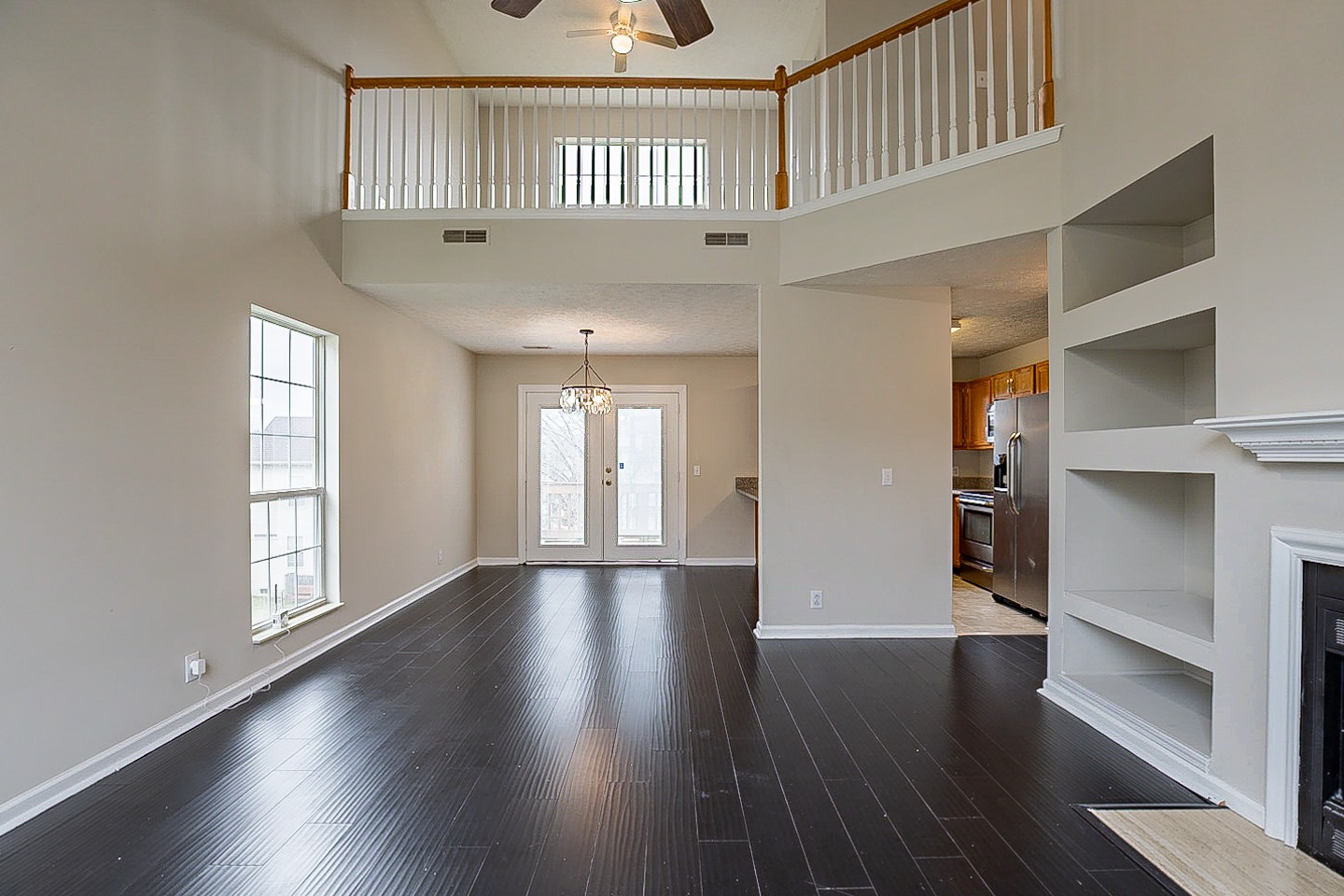 1008 Ridge Trail Goodlettsville, TN 37072 - Photo 9 of 21 an empty room with wooden floor and windows