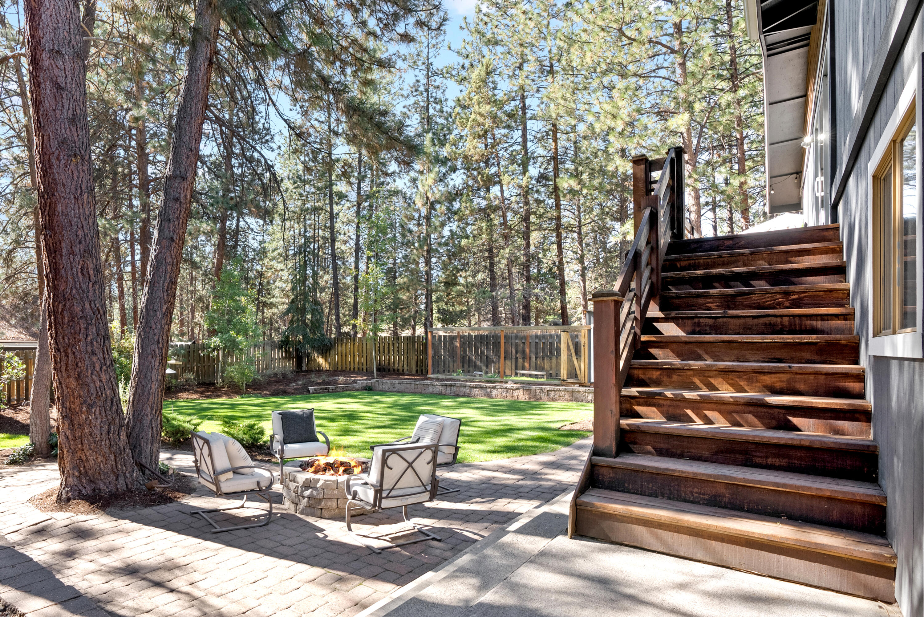 1961 Southwest Knoll Avenue Bend, OR 97702 - Photo 43 of 53 a view of a chairs in backyard of house