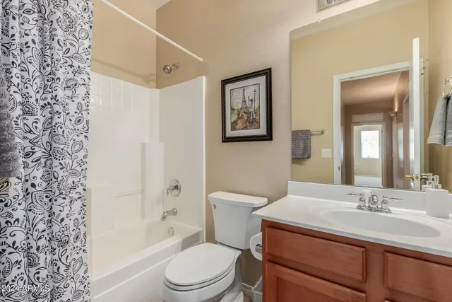 a view of a chairs and table in a patio