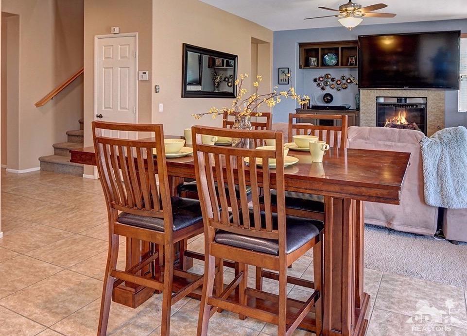 83447 Lone Star Road Indio, CA 92203 - Photo 11 of 47 a view of a dining room with furniture