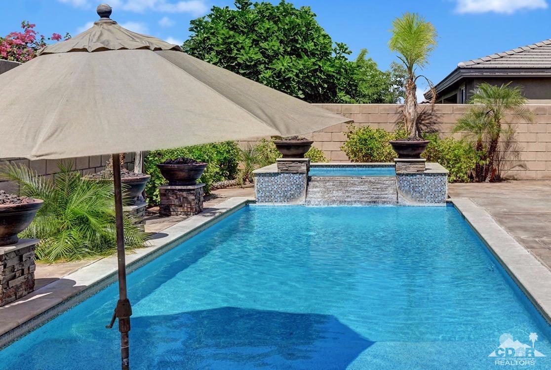 83447 Lone Star Road Indio, CA 92203 - Photo 3 of 47 swimming pool view with a seating space