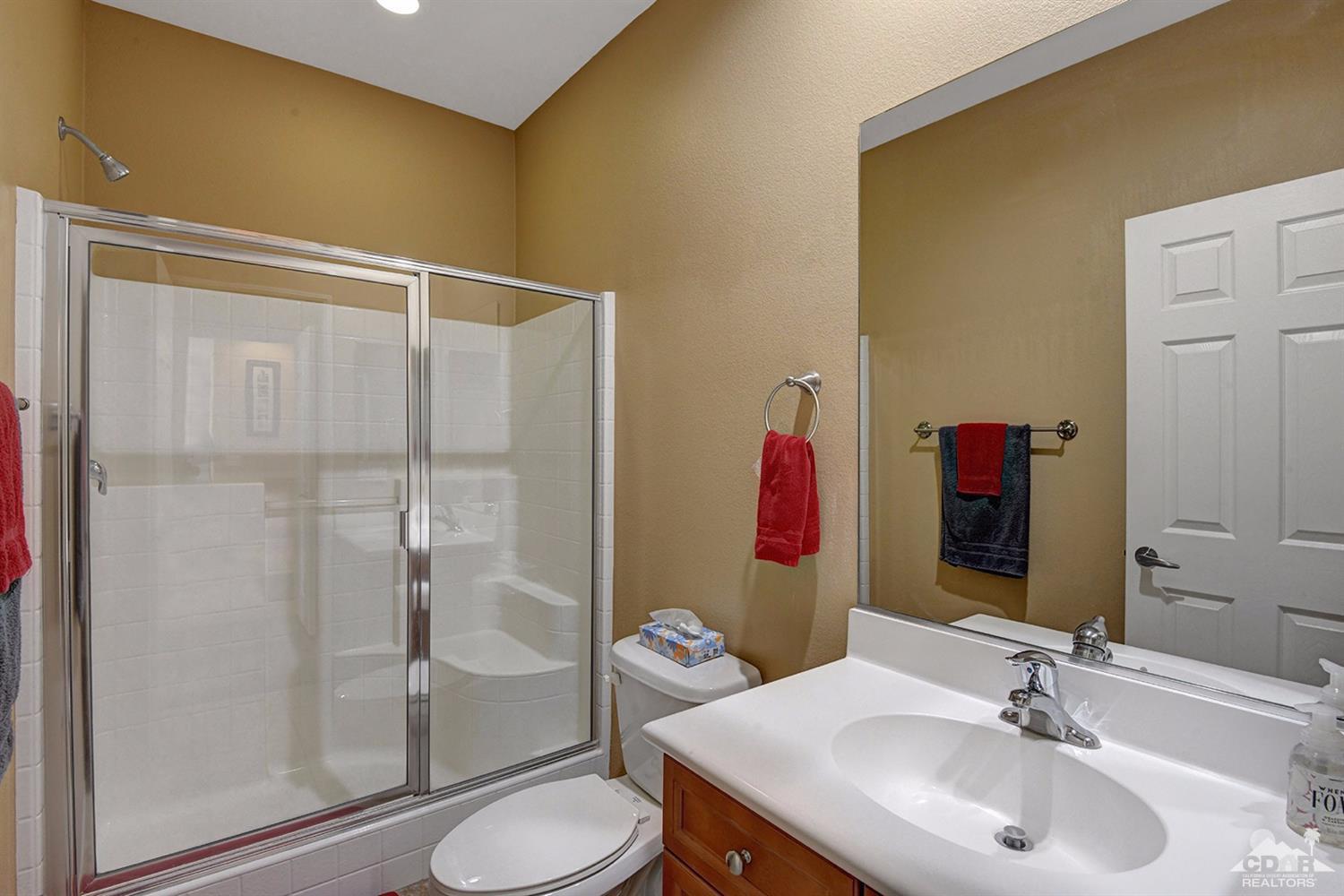 83447 Lone Star Road Indio, CA 92203 - Photo 23 of 47 a bathroom with a sink and a mirror