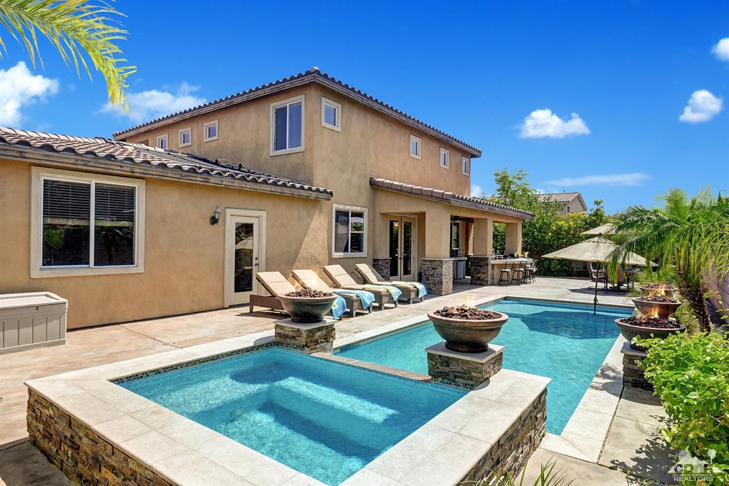 83447 Lone Star Road Indio, CA 92203 - Photo 42 of 47 a view of a house with swimming pool and sitting area