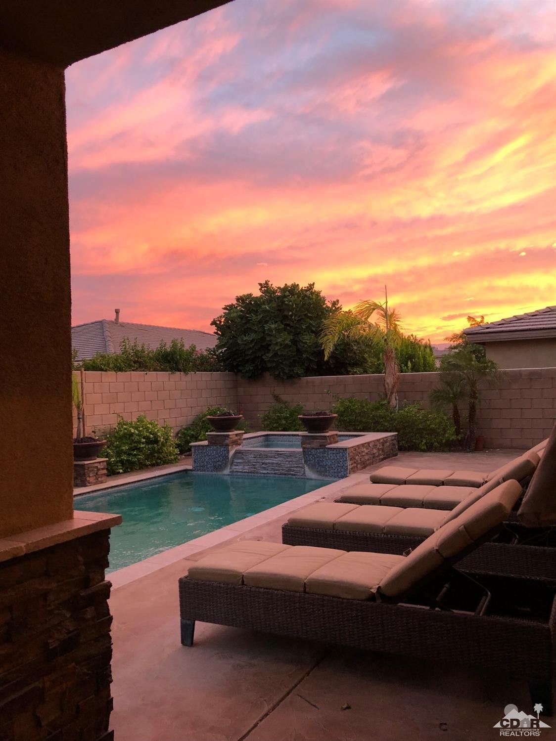 83447 Lone Star Road Indio, CA 92203 - Photo 47 of 47 a view of a yard with swimming pool and outdoor seating