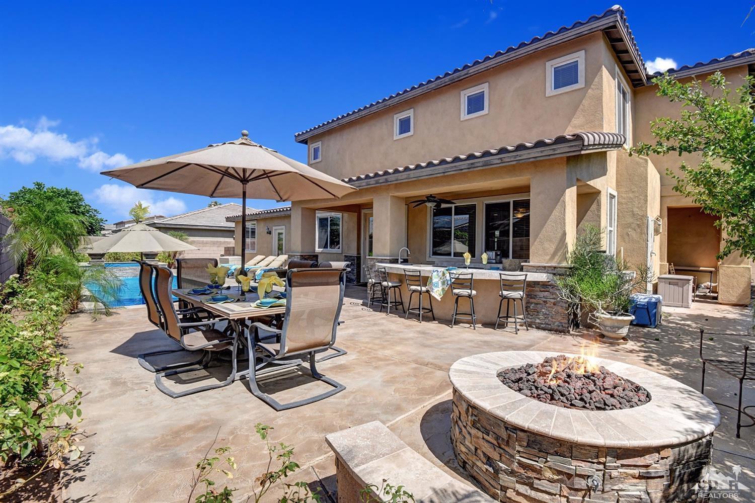 83447 Lone Star Road Indio, CA 92203 - Photo 7 of 47 a view of a dinning table and chairs in the patio
