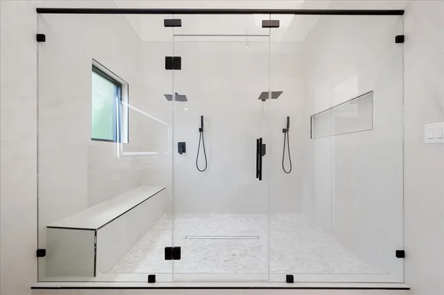 a view of a room with washer and dryer