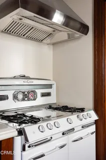 a bathroom with a sink toilet and mirror