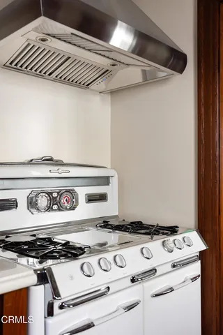 a bathroom with a sink toilet and mirror