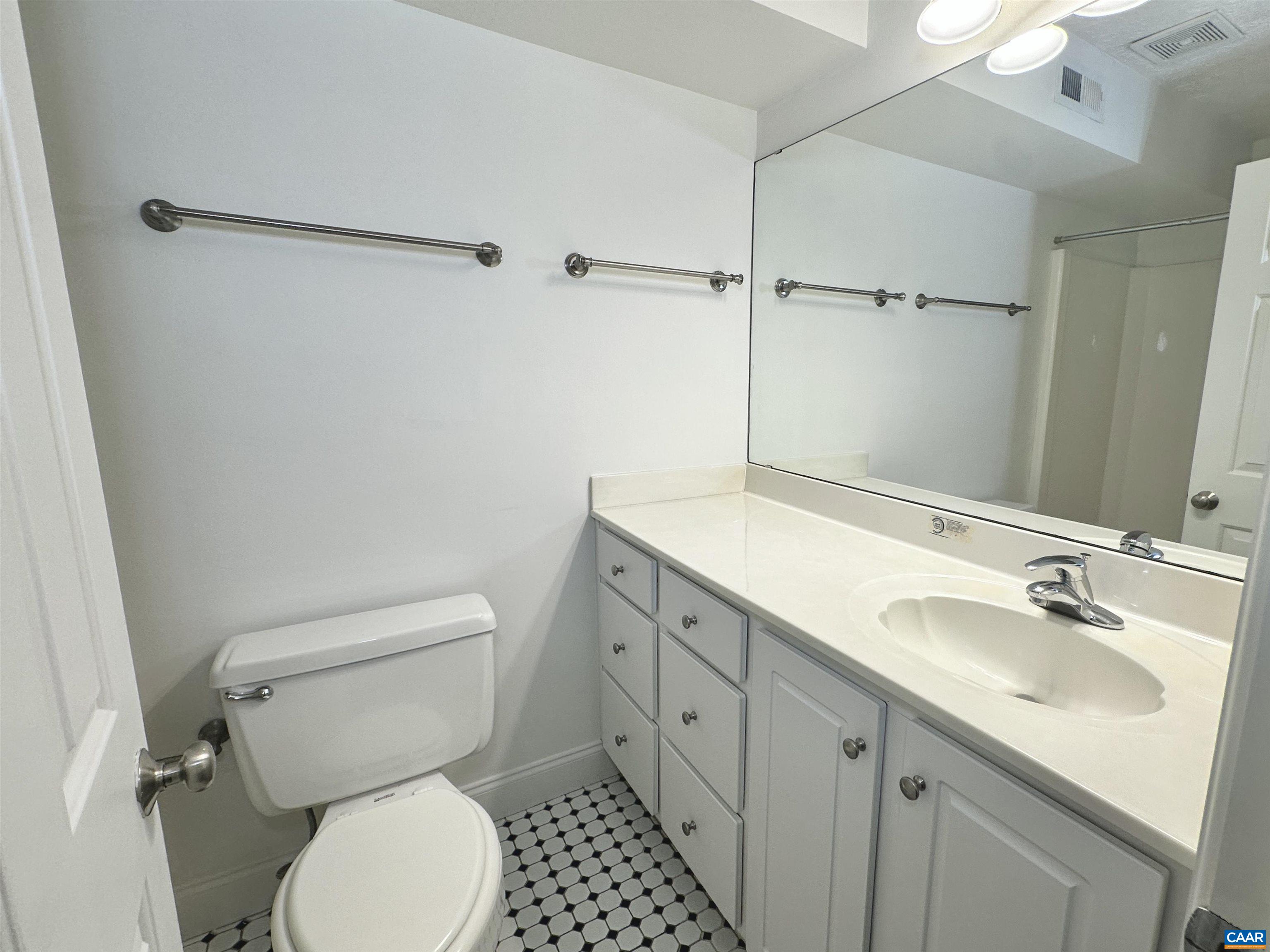 104 Turtle Creek Road, Unit 9 Charlottesville, VA 22901 - Photo 15 of 23 a bathroom with a sink toilet and shower