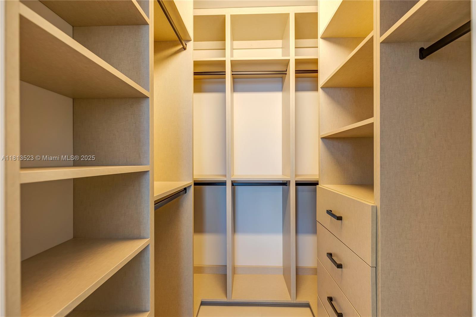 6301 Collins Avenue, Unit 1405 Miami Beach, FL 33141 - Photo 18 of 34 a view of walk in closet