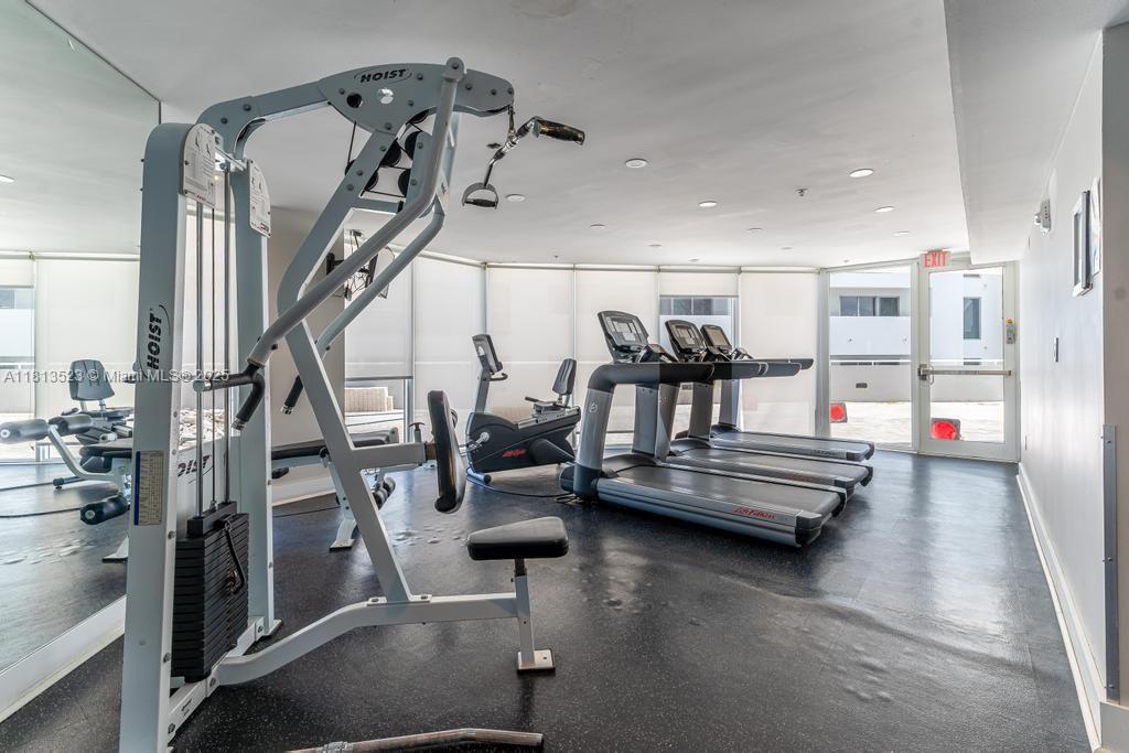 6301 Collins Avenue, Unit 1405 Miami Beach, FL 33141 - Photo 27 of 34 a view of a room with gym equipment