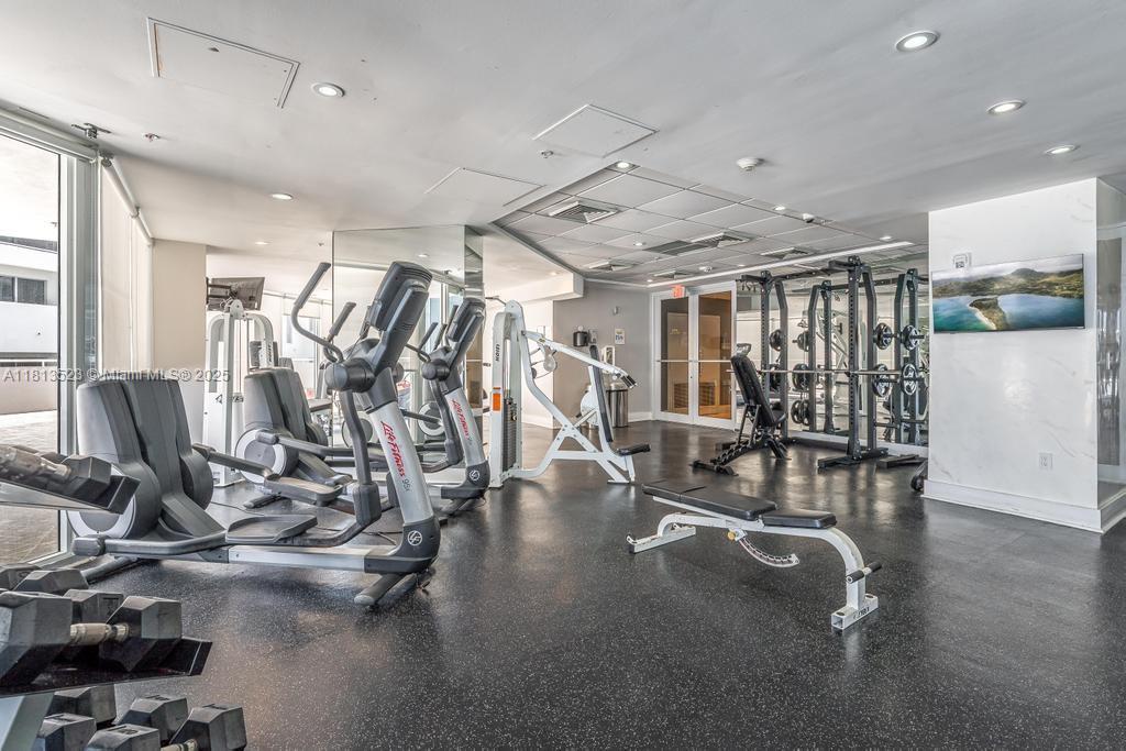 6301 Collins Avenue, Unit 1405 Miami Beach, FL 33141 - Photo 29 of 34 a view of a room with gym equipment