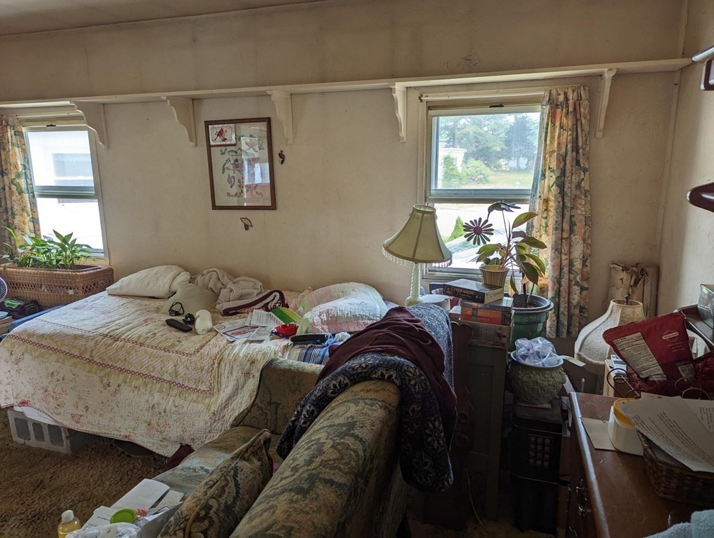16 King Drive Wareham, MA 02576 - Photo 11 of 17 a living room with furniture and a window