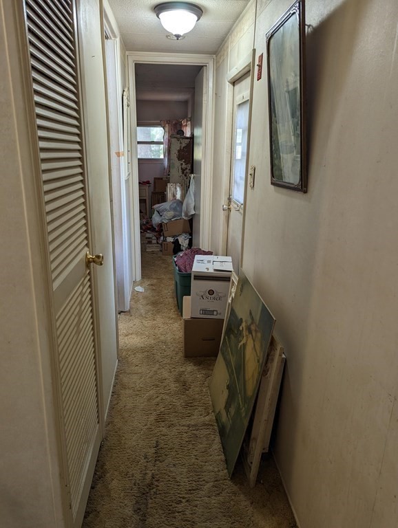 16 King Drive Wareham, MA 02576 - Photo 14 of 17 a living room with furniture and a gate