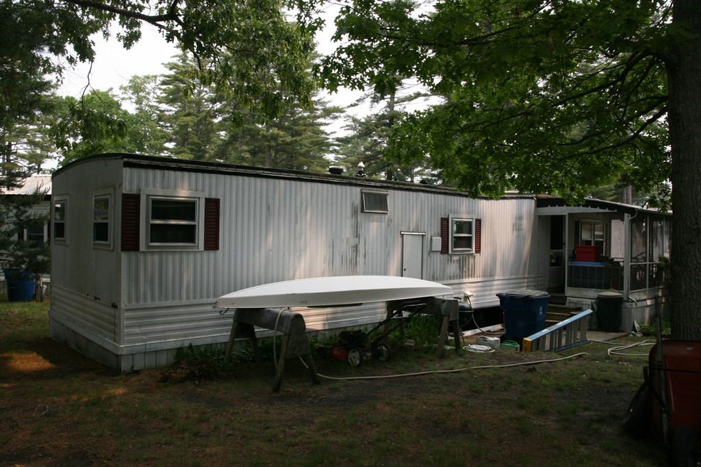 16 King Drive Wareham, MA 02576 - Photo 6 of 17 a view of backyard with deck and outdoor seating