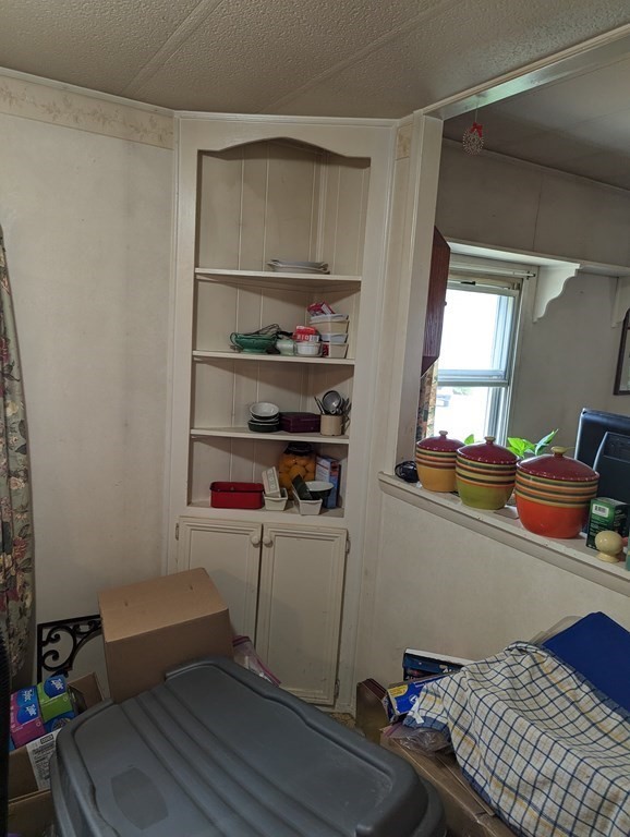 16 King Drive Wareham, MA 02576 - Photo 8 of 17 a room with storage and utility