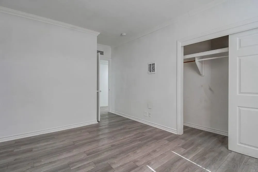 734-738 Grand Avenue Spring Valley, CA 91977 - Photo 12 of 30 a view of an empty room with wooden floor