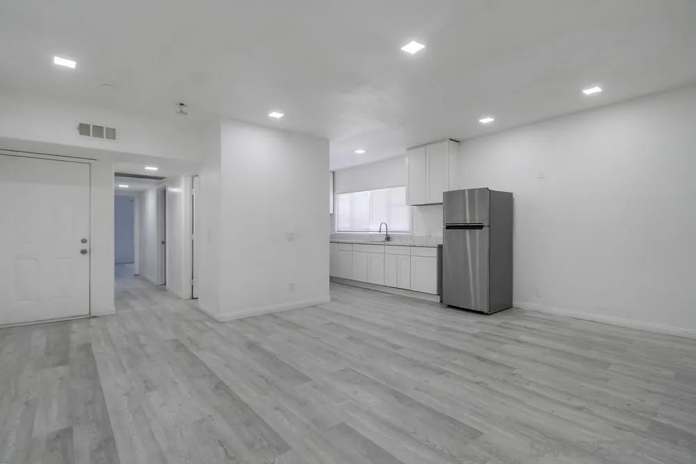 734-738 Grand Avenue Spring Valley, CA 91977 - Photo 17 of 30 a view of kitchen with refrigerator and window