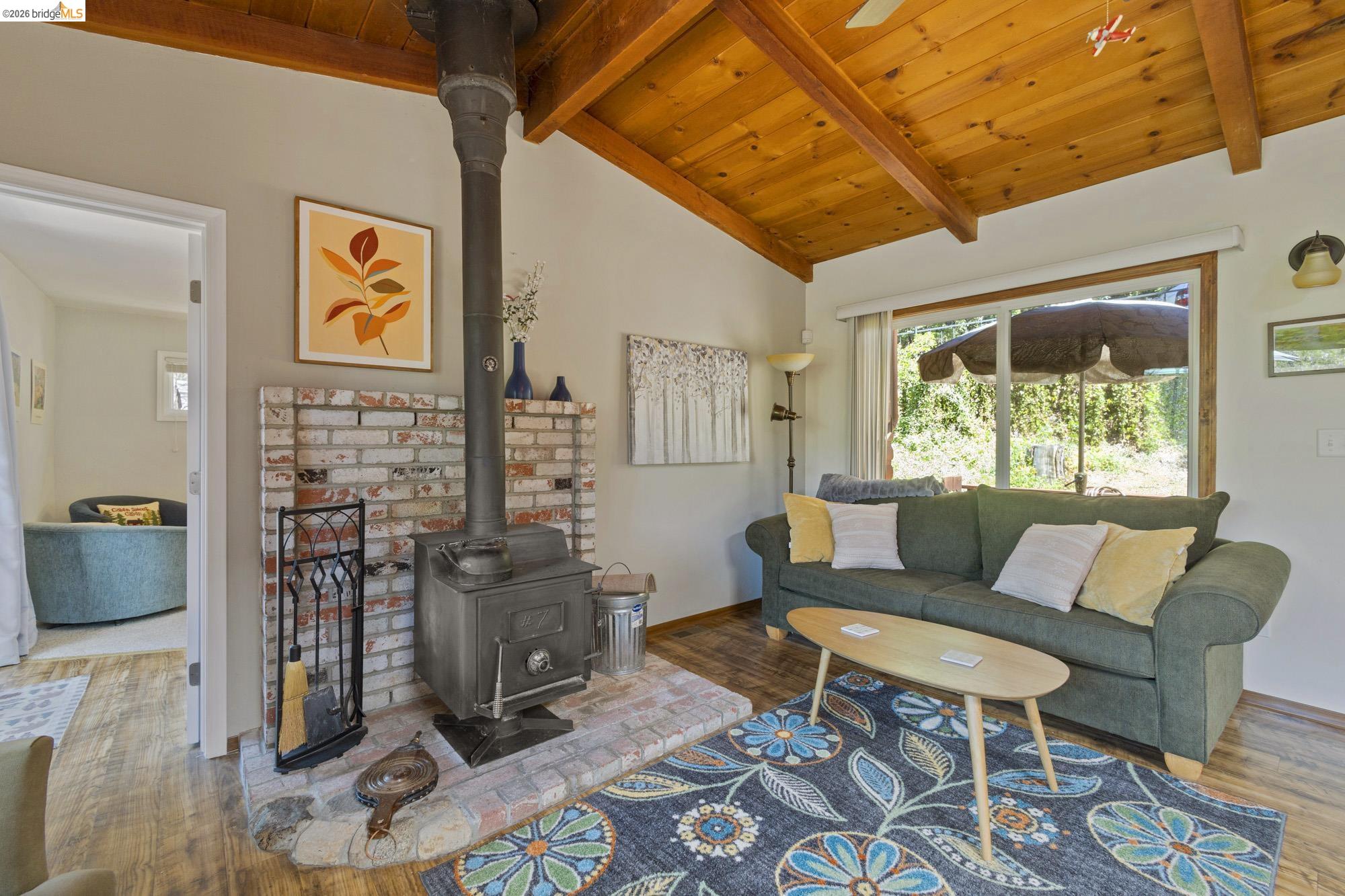 21815 Confidence Road Twain Harte, CA 95383 - Photo 11 of 30 a living room with furniture and a window