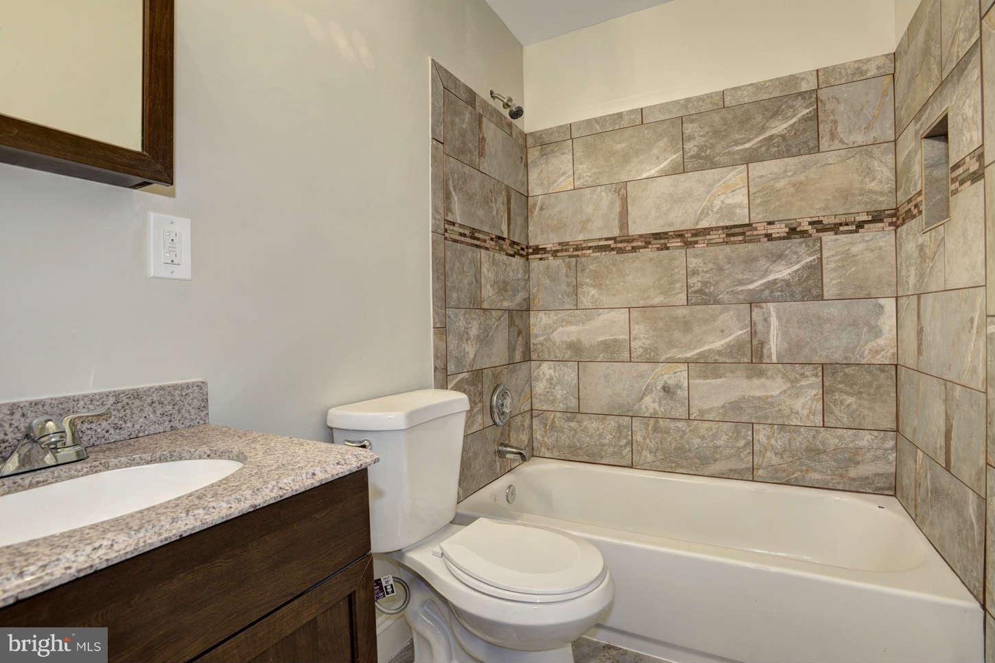 3627 Reisterstown Road Baltimore, MD 21215 - Photo 23 of 30 Hallway Full Bath with Soaking tub