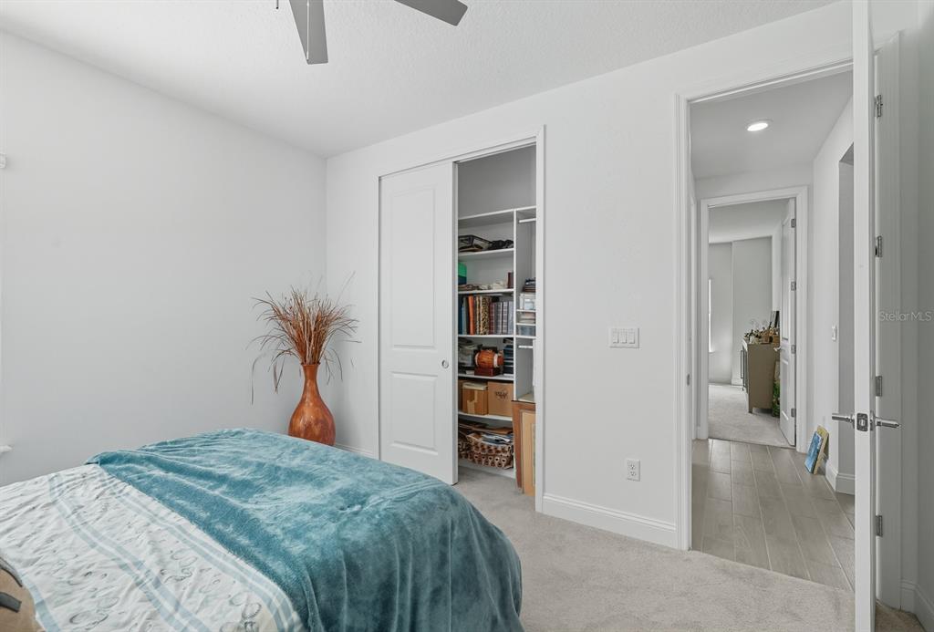 2128 Raglan Circle Ormond Beach, FL 32174 - Photo 32 of 55 a bedroom with a bed and a closet