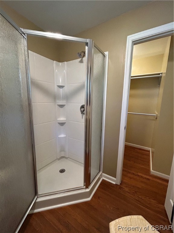 1489 Laurens Road Gloucester Point, VA 23062 - Photo 27 of 43 Master Bathroom featuring an enclosed shower and hardwood / wood-style flooring