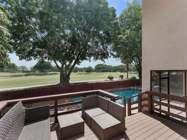 a view of sitting area with furniture and garden