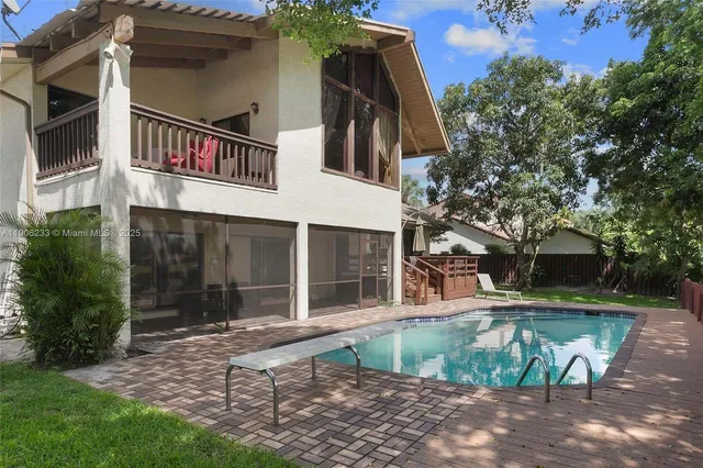 a house with trees in front of it