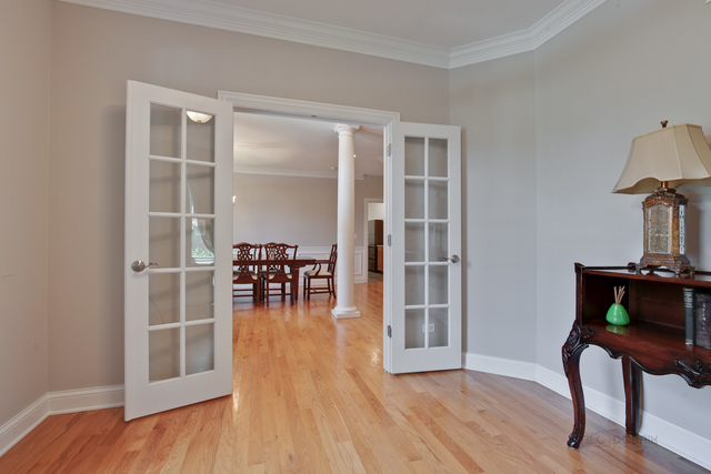 1007 Whitfield Road Northbrook, IL 60062 - Photo 4 of 27 a view of workspace with wooden floor and furniture