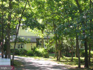 222 Oakshade Road Tabernacle, NJ 08088 - Photo 1 of 1 a front view of a house with a yard
