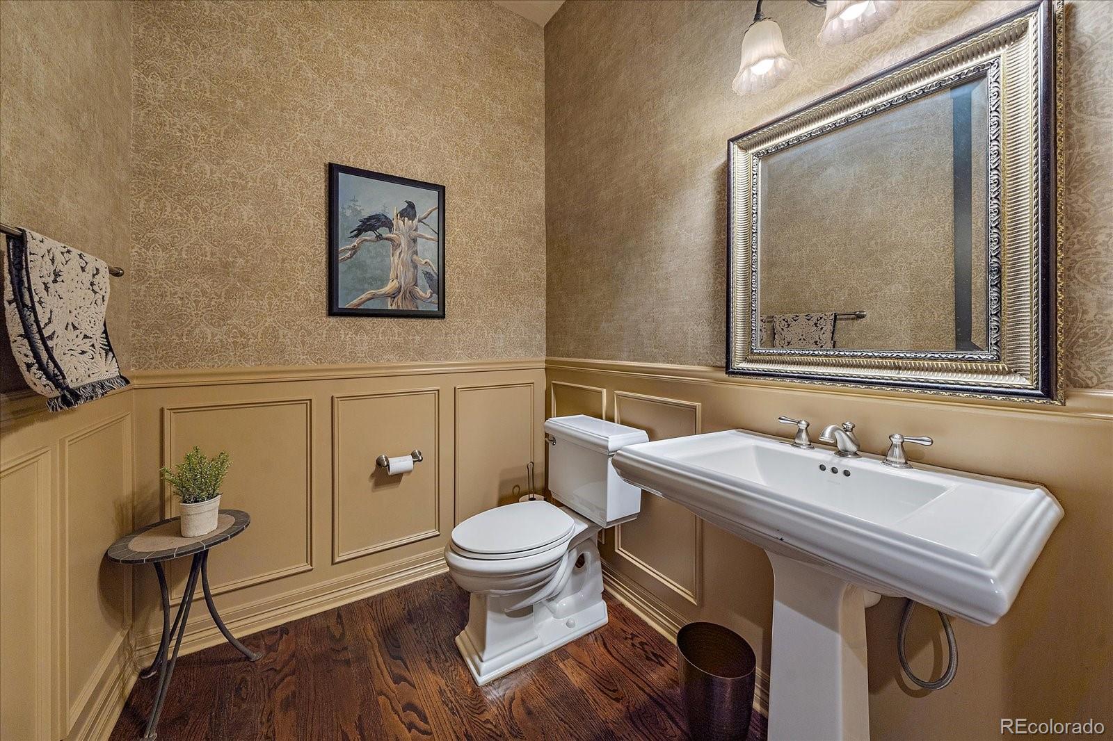 20132 East Shady Ridge Road Parker, CO 80134 - Photo 16 of 36 a bathroom with a sink and a mirror
