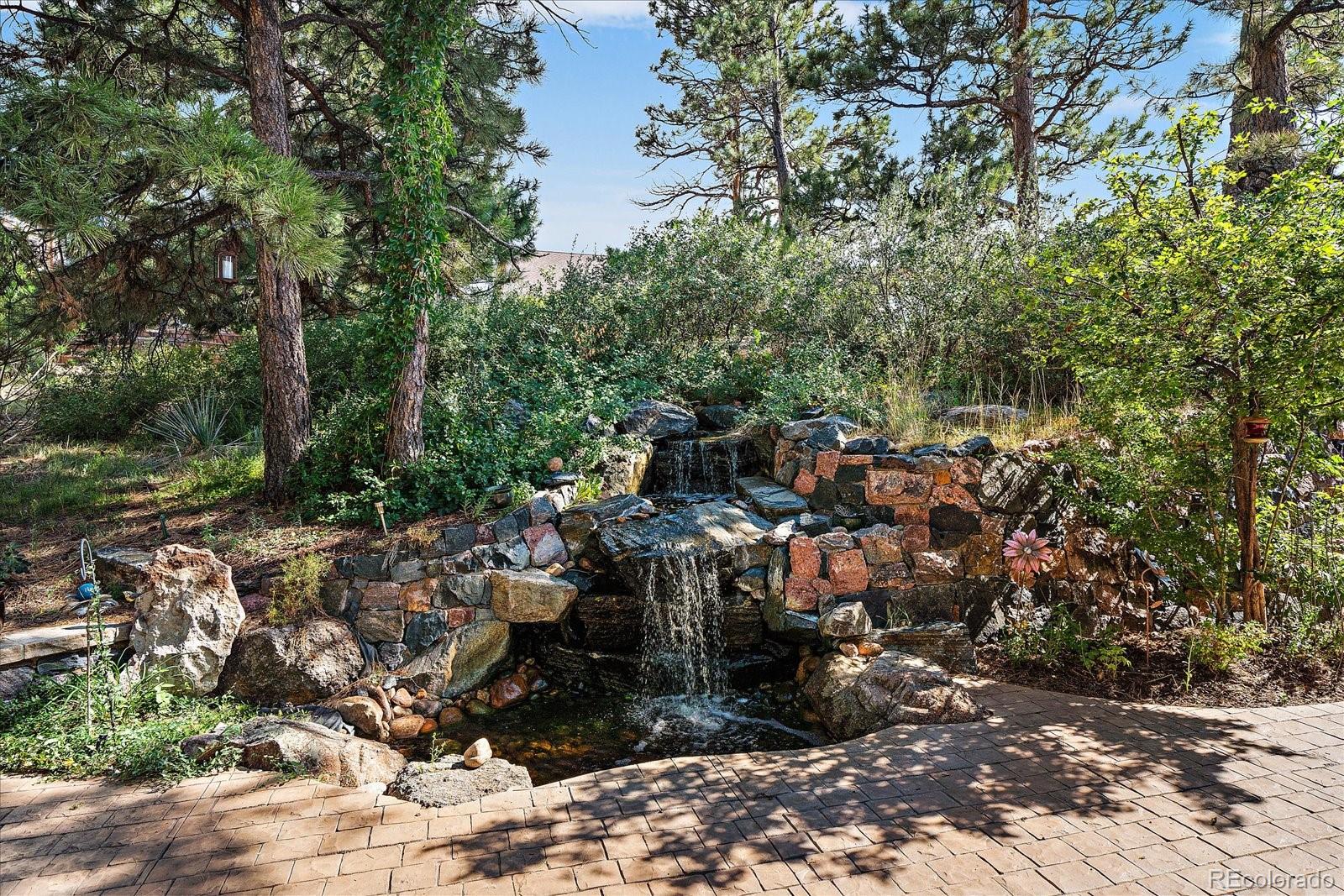 20132 East Shady Ridge Road Parker, CO 80134 - Photo 31 of 36 a view of a city with tall trees