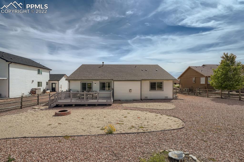 12118 Rio Secco Road Peyton, CO 80831 - Photo 23 of 23 a view of a house with a patio