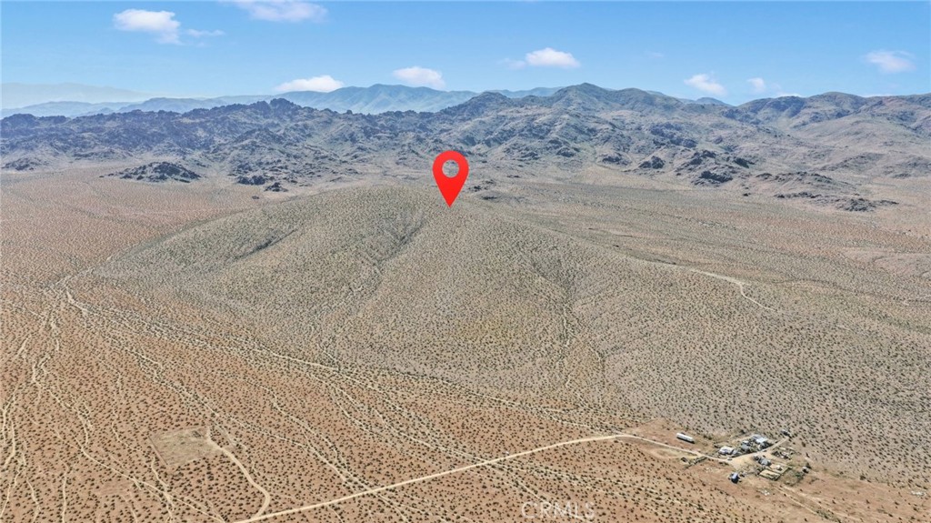 11 Highway 247/brack Road Lucerne Valley, CA 92356 - Photo 3 of 9 a view of a dry yard with mountain view