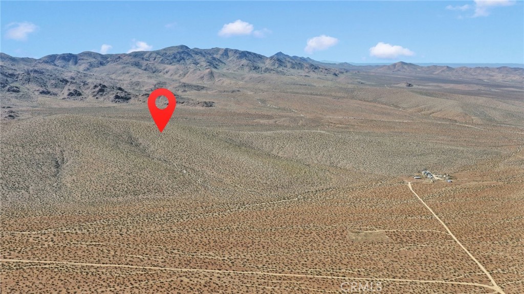 11 Highway 247/brack Road Lucerne Valley, CA 92356 - Photo 4 of 9 a view of a dry yard