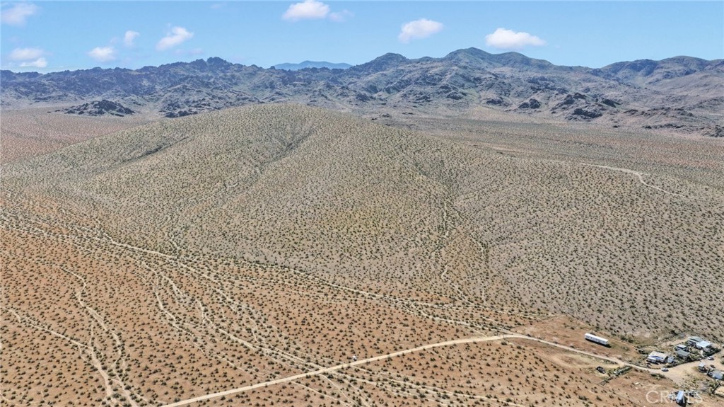 11 Highway 247/brack Road Lucerne Valley, CA 92356 - Photo 9 of 9 a view of a dry yard with mountain
