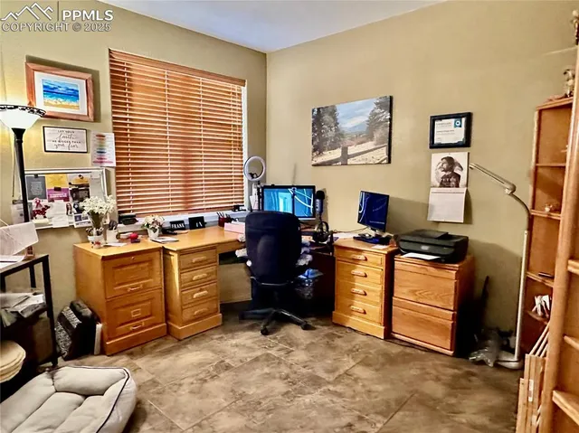 a kitchen with a stove and a refrigerator