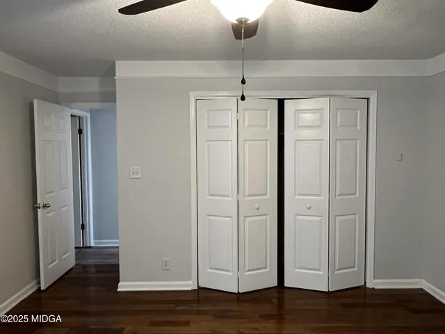 a view of a livingroom with wooden floor