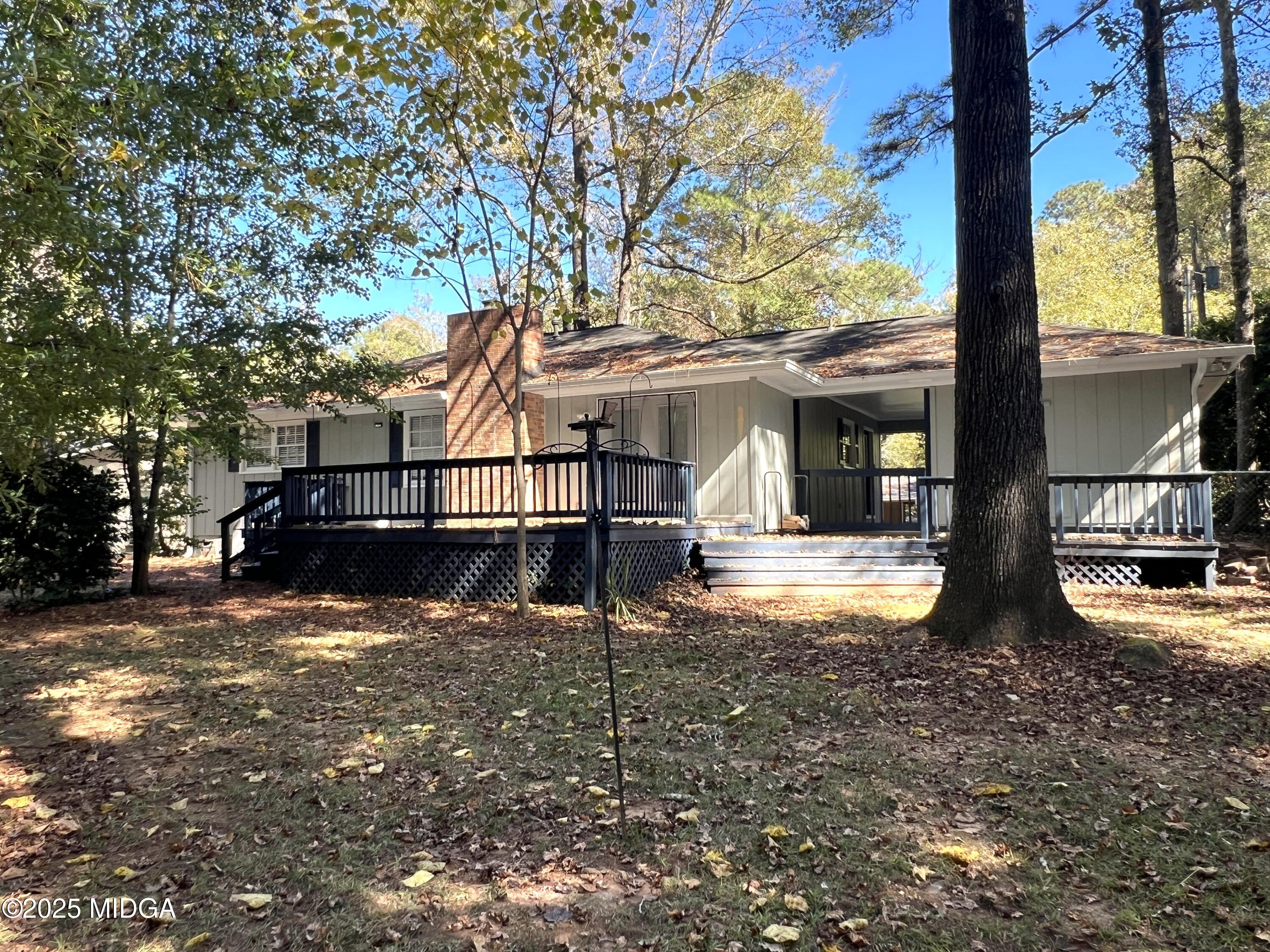1149 Runnymede Lane Macon, GA 31220 - Photo 25 of 25 a view of a house with a yard
