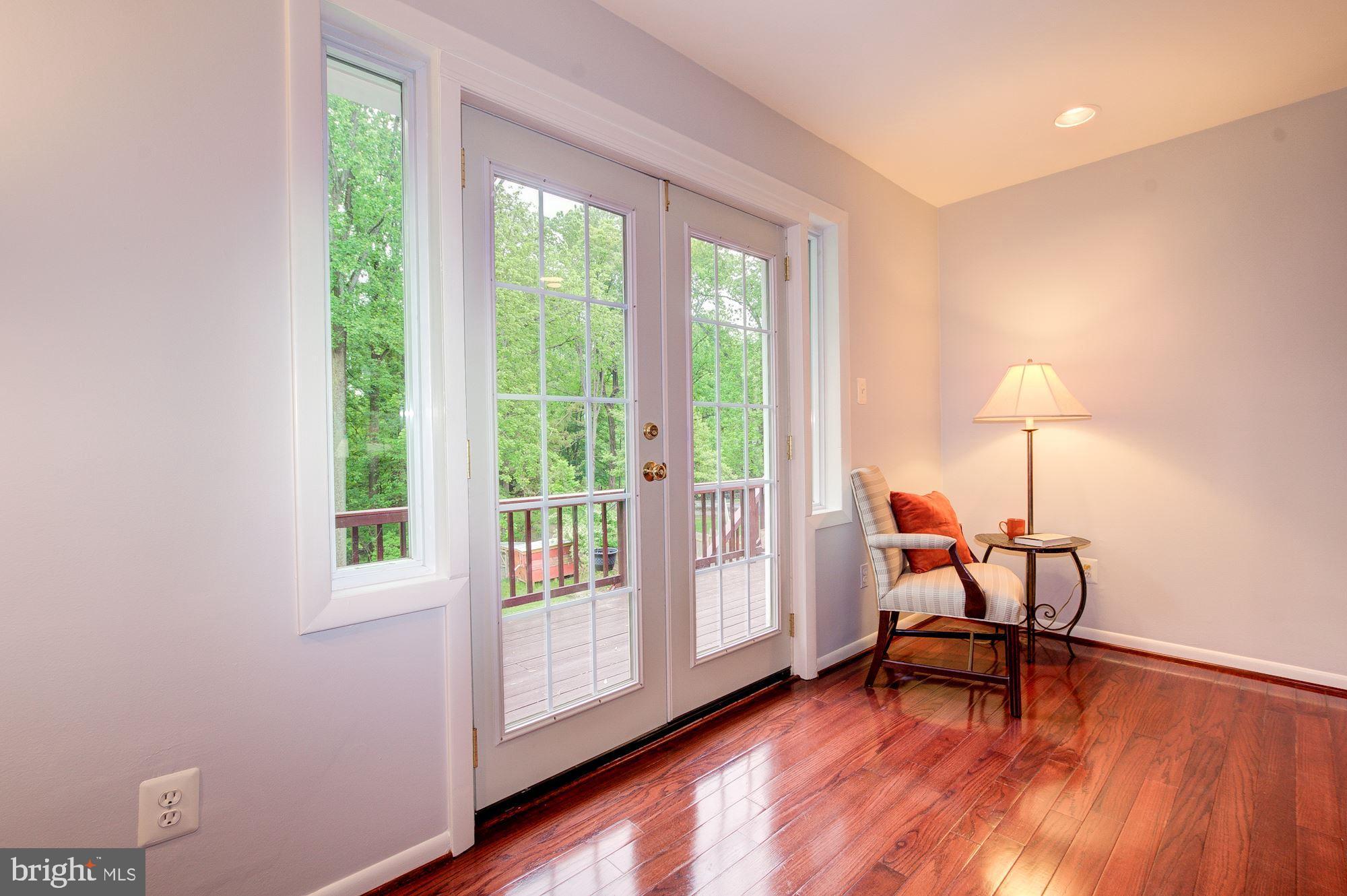 12825 Jingle Lane Silver Spring, MD 20906 - Photo 3 of 29 Living room w/ French Doors to deck.