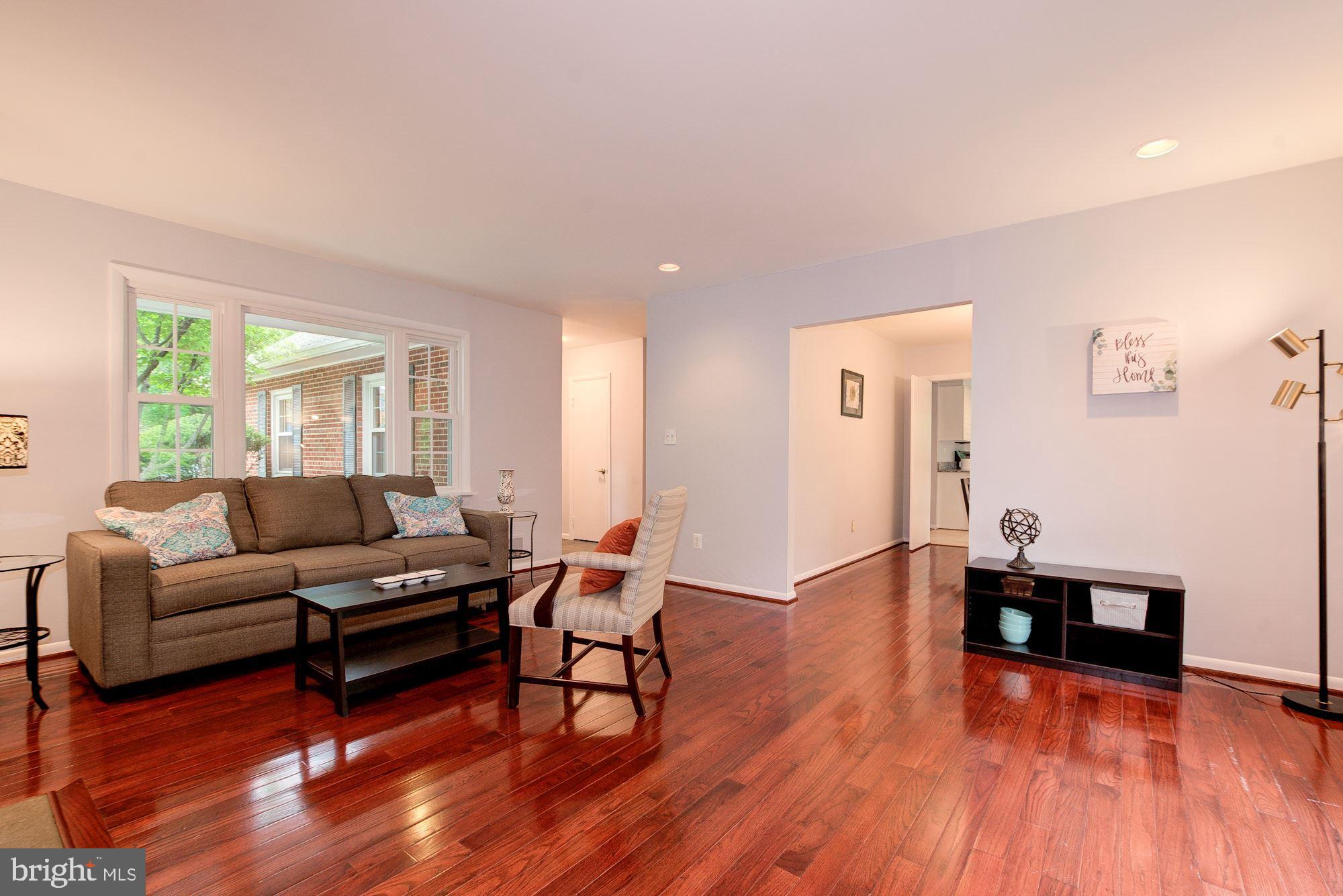 12825 Jingle Lane Silver Spring, MD 20906 - Photo 5 of 29 Gleaming floors! Big windows let in lots of light.
