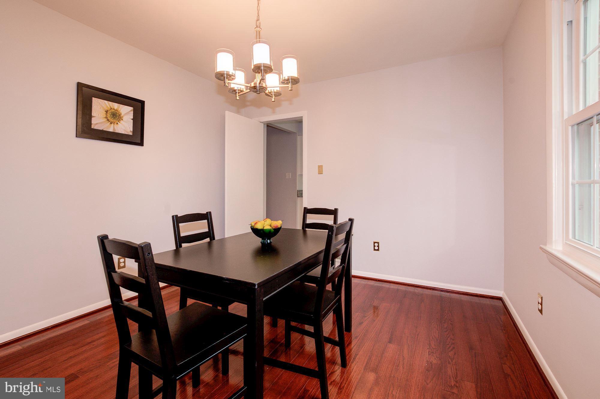 12825 Jingle Lane Silver Spring, MD 20906 - Photo 6 of 29 Large dining room with new chandelier!