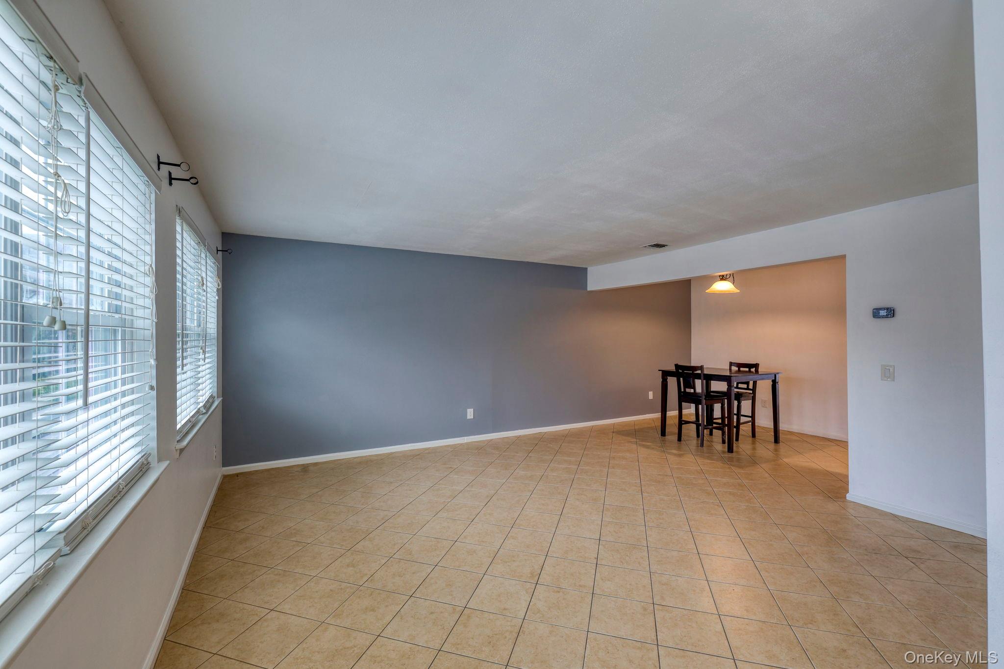 276 Temple Hill Road, Unit 2513 New Windsor, NY 12553 - Photo 10 of 15 a view of an empty room with a window