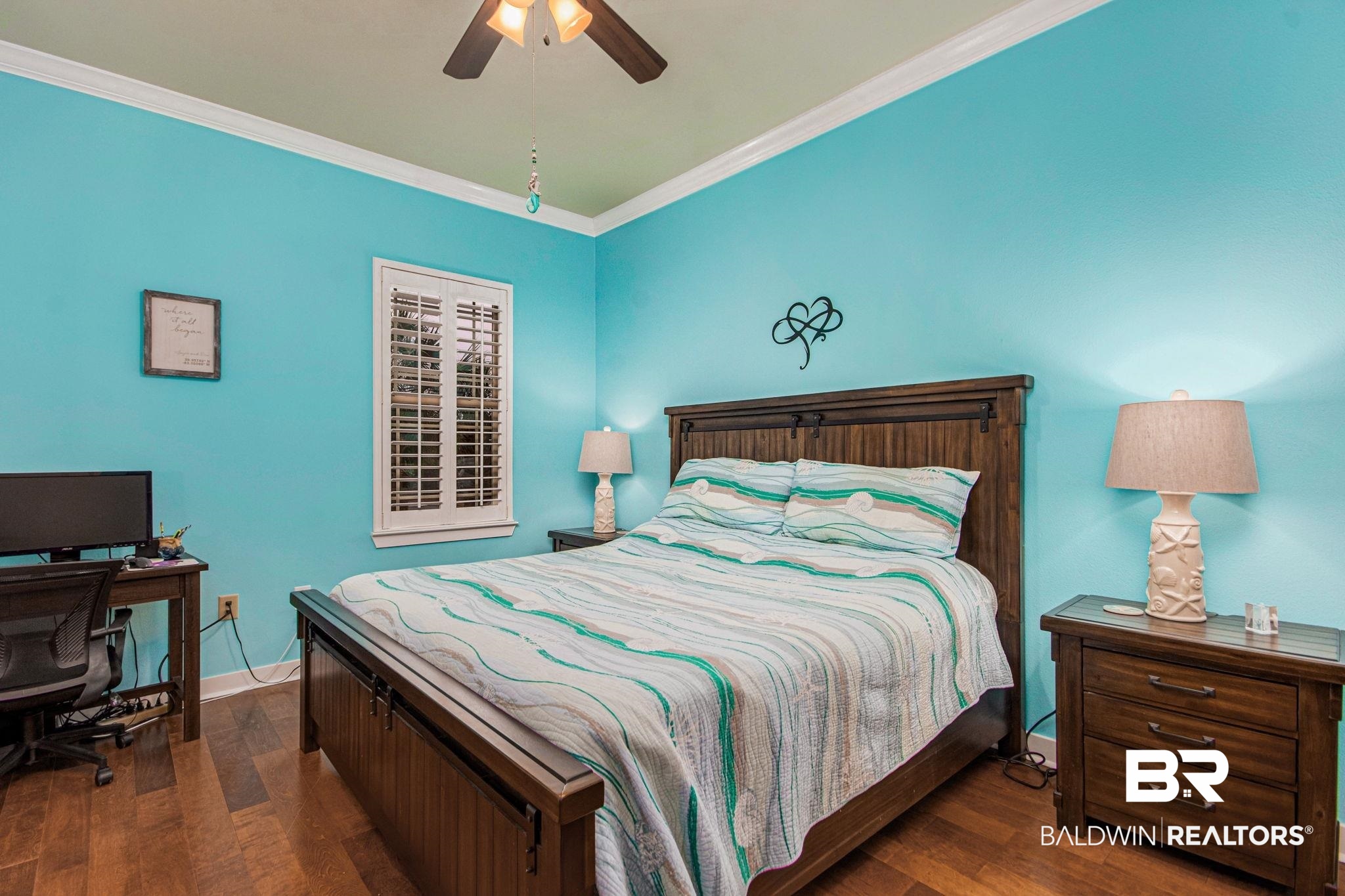 1430 Regency Road, Unit I201 Gulf Shores, AL 36542 - Photo 13 of 34 Bedroom with ceiling fan, dark hardwood / wood-style flooring, and crown molding