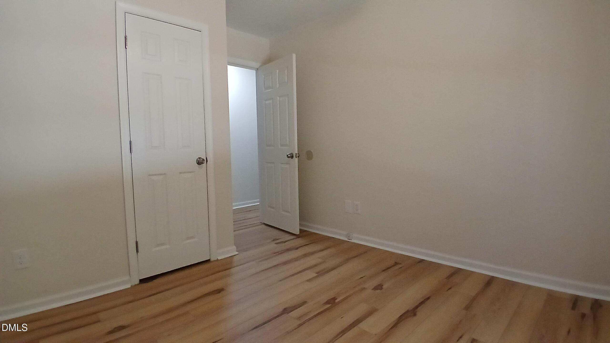 2224 Bufflehead Road Raleigh, NC 27616 - Photo 12 of 33 a view of an empty room with wooden floor