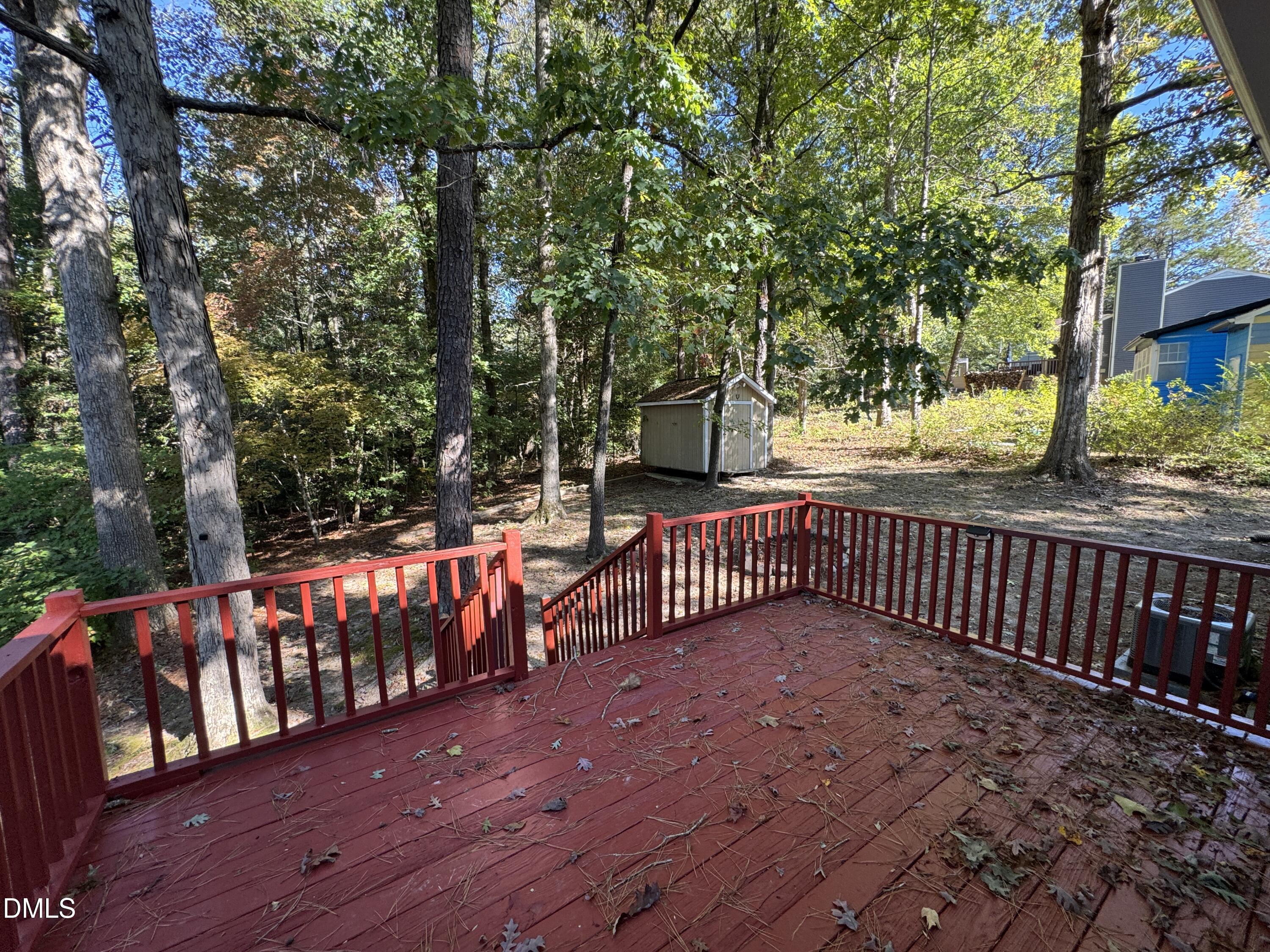 2224 Bufflehead Road Raleigh, NC 27616 - Photo 24 of 33 a view of a porch with wooden floor and fence