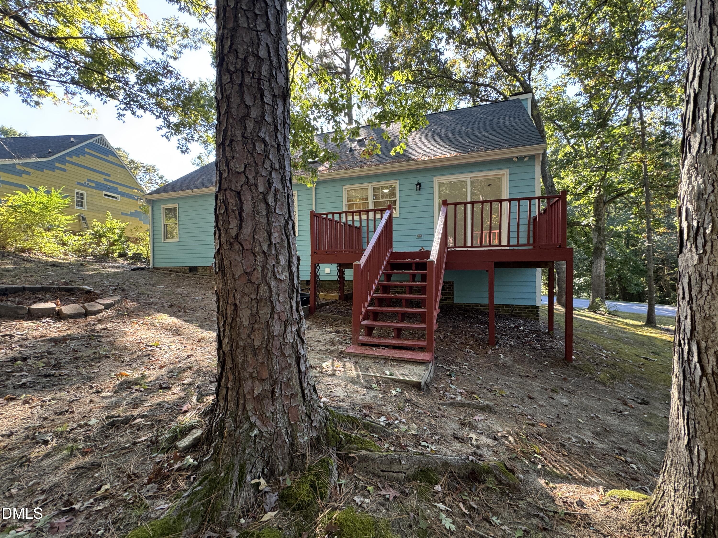 2224 Bufflehead Road Raleigh, NC 27616 - Photo 29 of 33 a view of a house with backyard and a tree