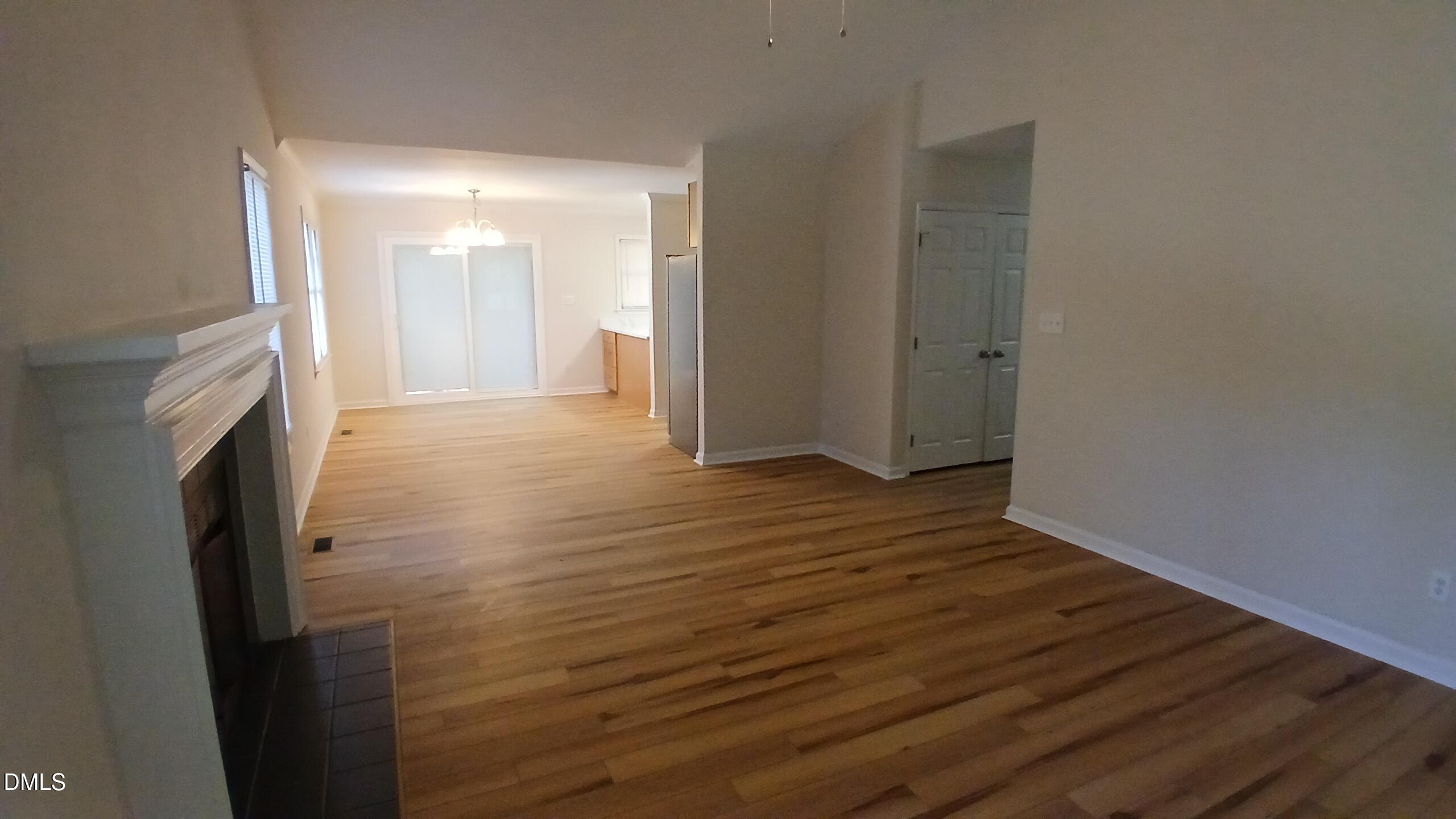 2224 Bufflehead Road Raleigh, NC 27616 - Photo 4 of 33 a view of hallway with wooden floor